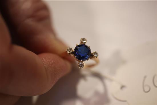 A gold, sapphire and diamond ring, size N.